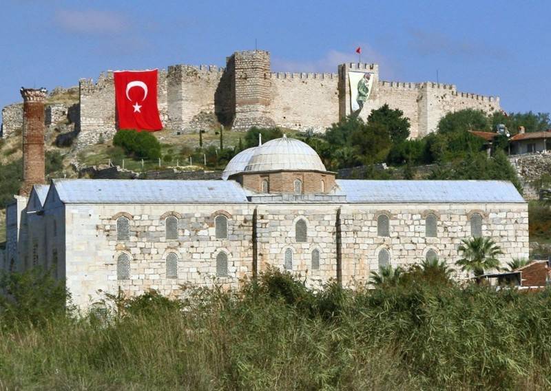 Historic Roman aqueducts in Selcuk town center during a private heritage tour